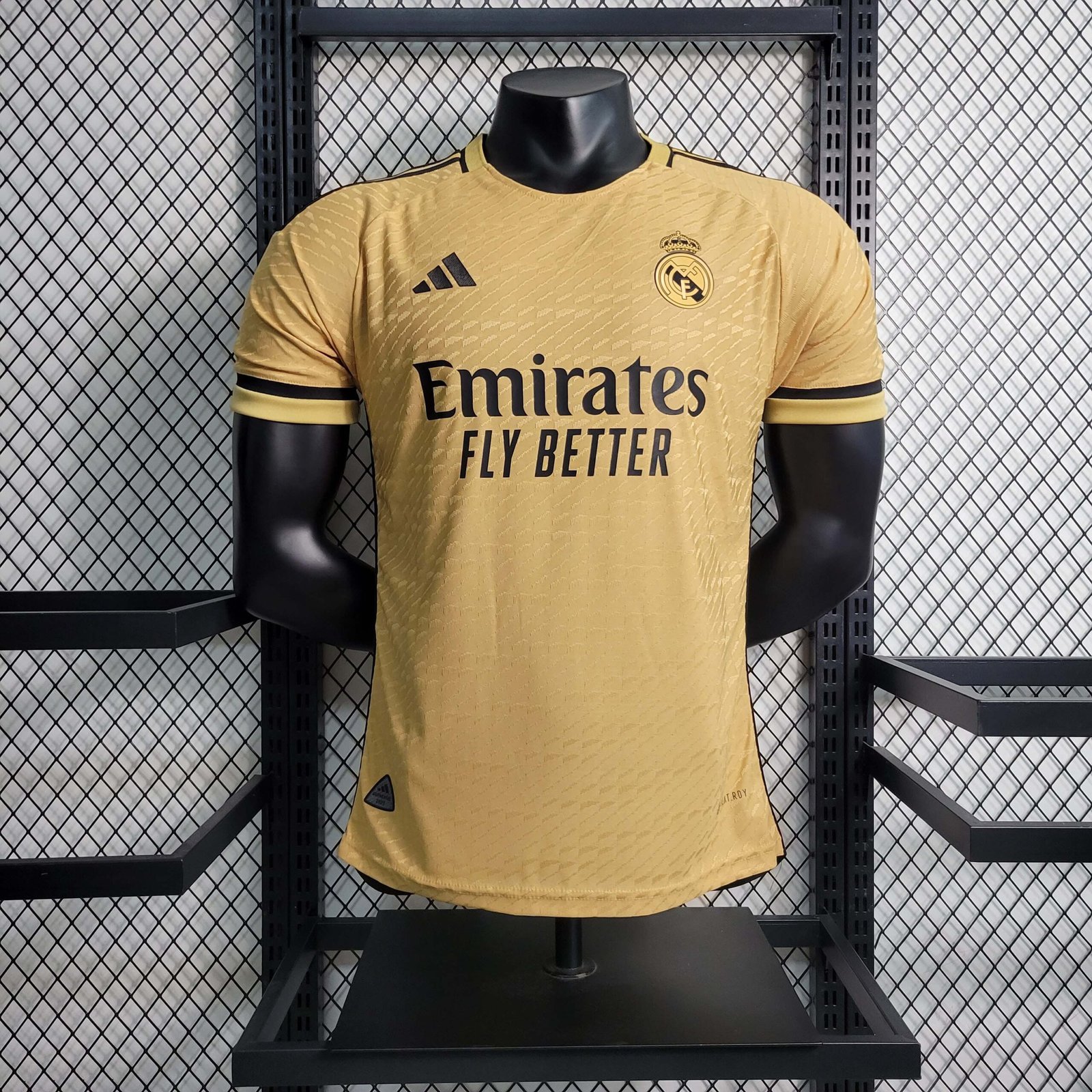53a30da02eded9e2666cb4751f2d10c3.jpg 2023/2024 Player Version Real Madrid Special Edition golden Football Shirt - Image 1