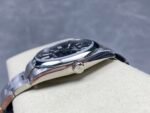 Rolex Oyster Perpetual 41mm Bright Black Dial Smooth Bezel Oyster Bracelet (124300) DD3230 Movement - Image 6