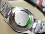 Rolex Oyster Perpetual 41mm Bright Black Dial Smooth Bezel Oyster Bracelet (124300) DD3230 Movement - Image 9