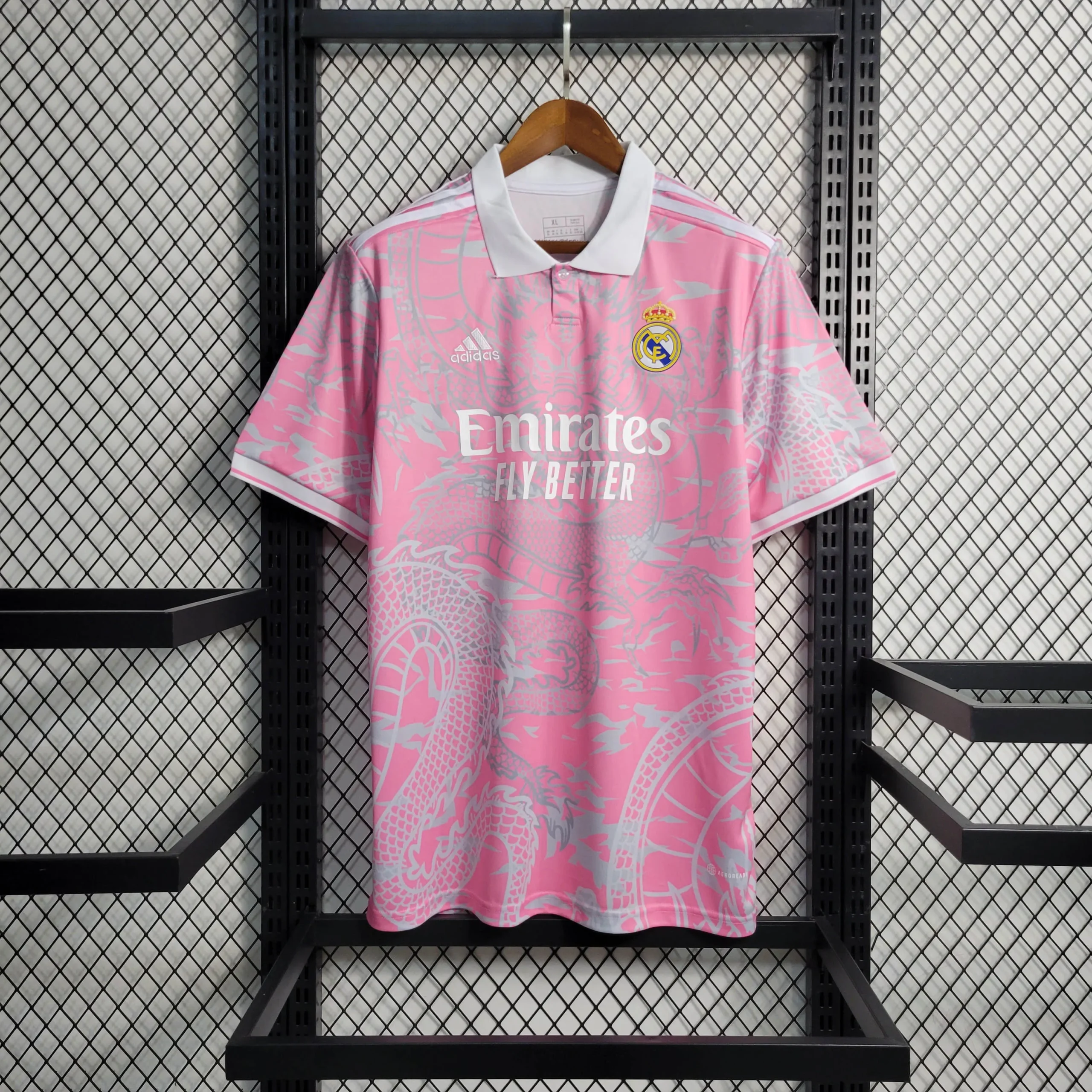 d4a8aeb1c4dd5e3c729c746f90d7ec80.webp 2023/2024 Real Madrid Chinese Dragon Pink Football Shirt - Image 1