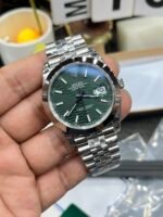 Rolex Datejust 41mm Green Fluted Motif Dial Smooth Bezel Jubilee Bracelet (126300) DD3235 Movement - Image 6