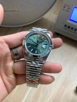 Rolex Datejust 41mm Mint Green Sunburst Dial Smooth Bezel Jubilee Bracelet (126300) DD3235 Movement - Image 3