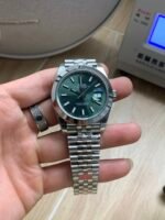 Rolex Datejust 41mm Mint Green Sunburst Dial Smooth Bezel Jubilee Bracelet (126300) DD3235 Movement - Image 2
