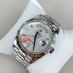 Rolex Day-Date 40 White Mother of Pearl Baguette Diamond Dial (228236) DD3255 Movement - Image 3