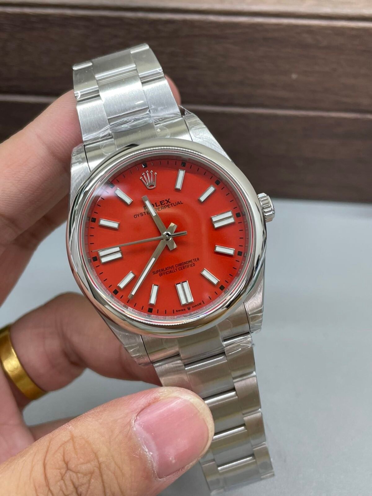 Rolex Oyster Perpetual 41mm Coral Red Dial Smooth Bezel Oyster Bracelet (124300) DD3230 Movement - Image 3
